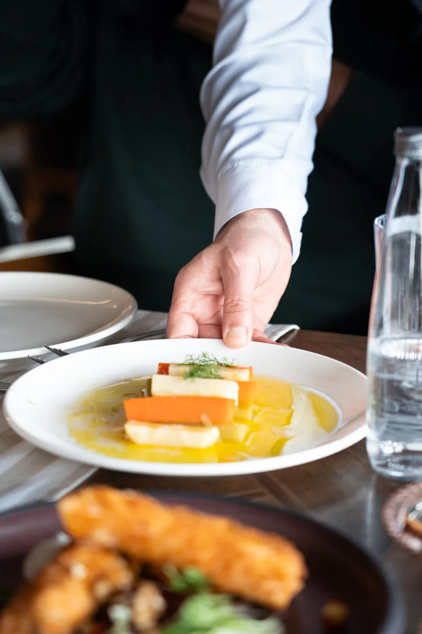 Executive Chef plating a signature dish