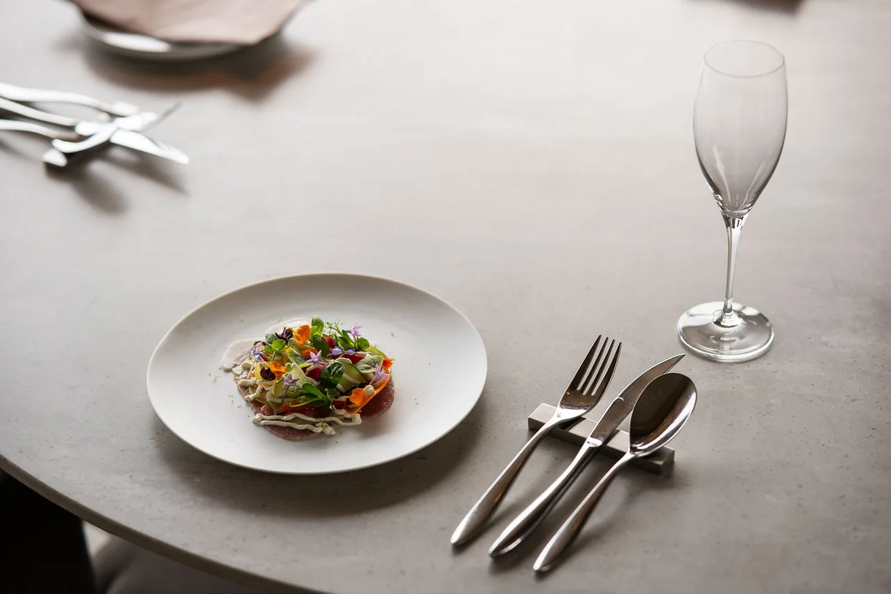 Chic tableware and gourmet salad